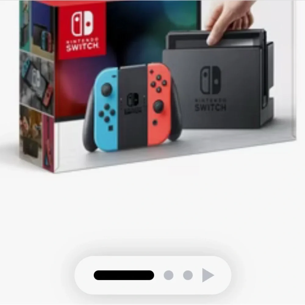 Nintendo Console with Red and Blue Controllers